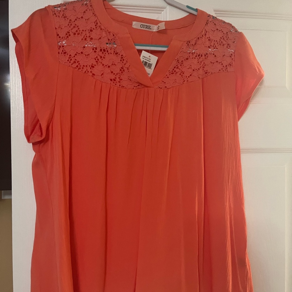Pink Pleated Blouse with Bib Collar and Embellished Details
